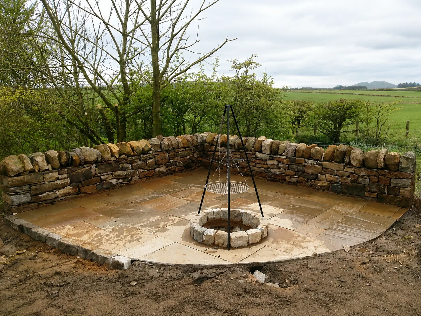 Hand-built dry stone fire pit and patio in the countryside near Edinburgh